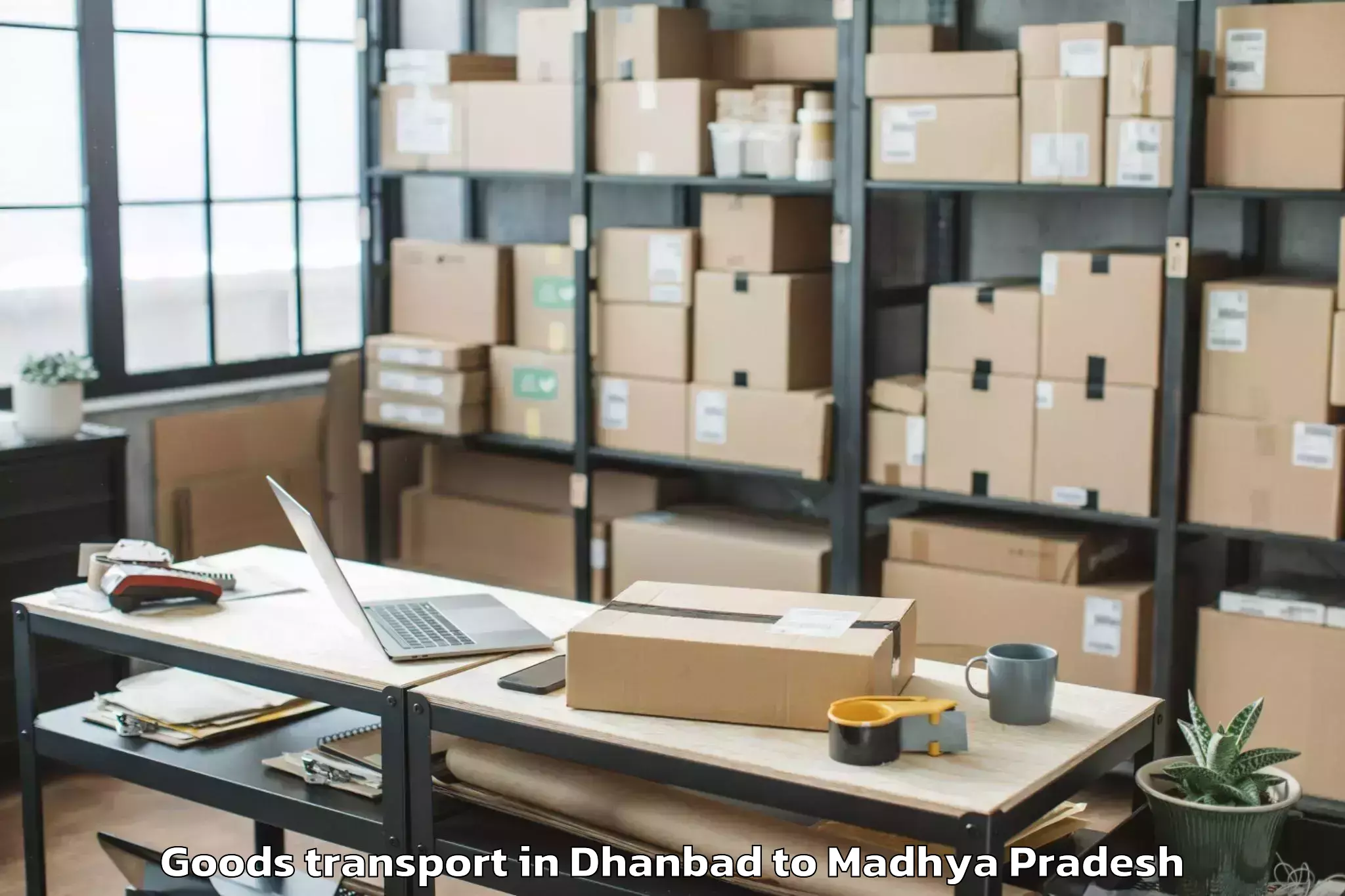 Book Your Dhanbad to Manpur Goods Transport Today